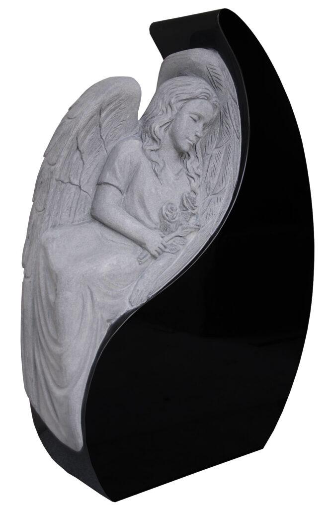 Angel In Teardrop Headstone A carved angel statue holds roses, set against a sleek black background, symbolizing remembrance and reflection, enhancing memorial contexts.