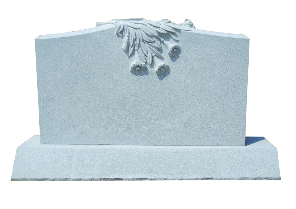 Classic Serp 9 Gray granite headstone with a floral design at the top, symbolizing remembrance and honoring the deceased. Suitable for a memorial context.