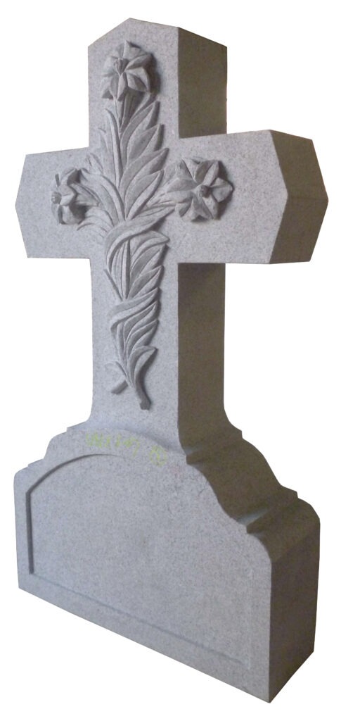 Floral Cross 1 Carved granite cross adorned with floral motifs, symbolizing remembrance and respect for the deceased, typically used in memorial settings.