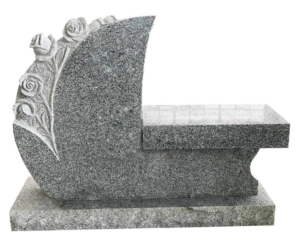 Tear Drop with Flowers Bench featuring carved roses and a curved design, symbolizing remembrance and honoring the deceased. Ideal for memorial settings.