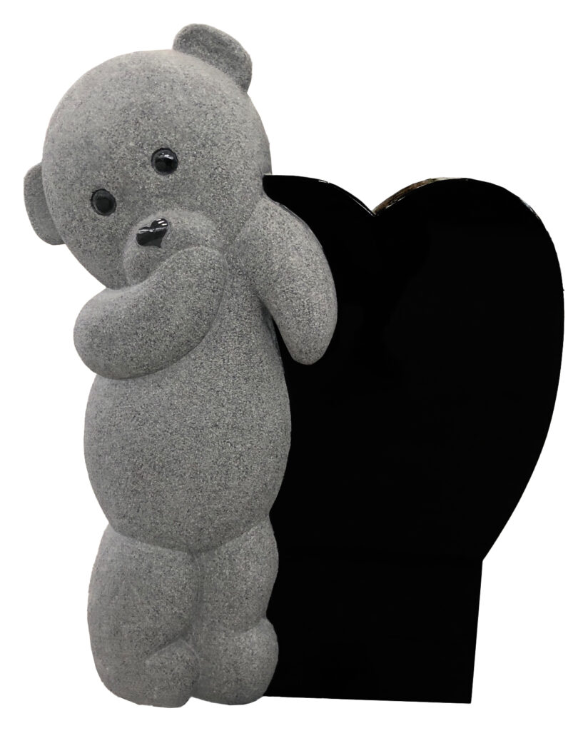 Gray bear statue with a heart-shaped backdrop, conveying warmth and affection. Ideal for greeting areas or decorative displays.