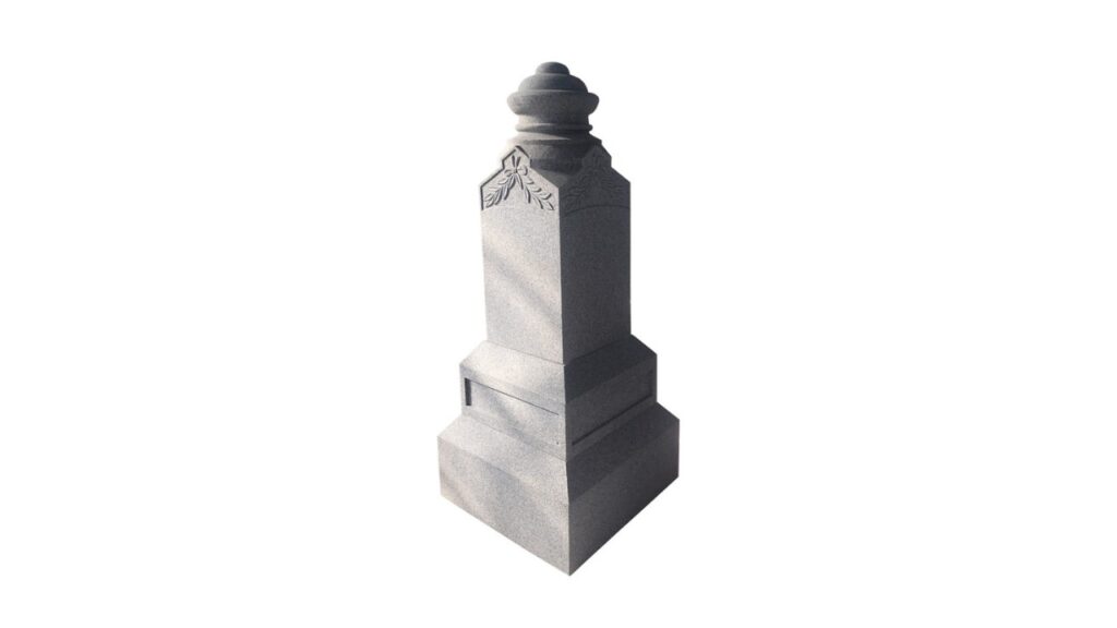 Granite obelisk headstone with dome top