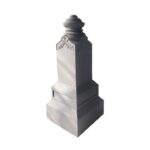 Granite obelisk headstone with dome top